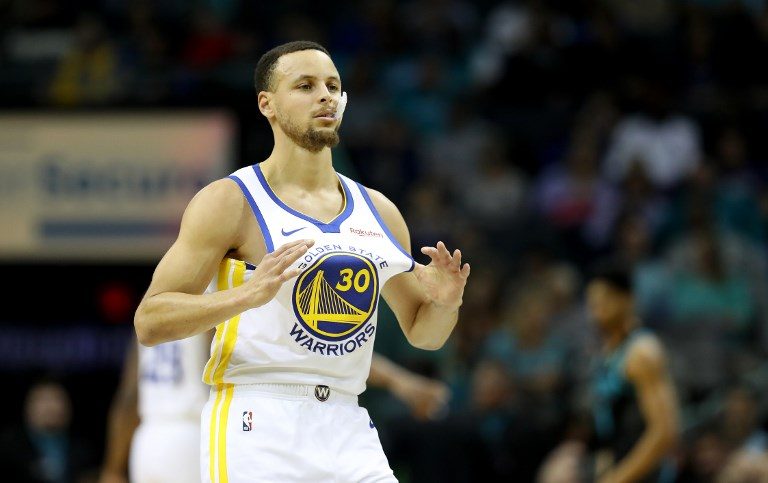Minus Durant, Warriors survive late Rockets rally