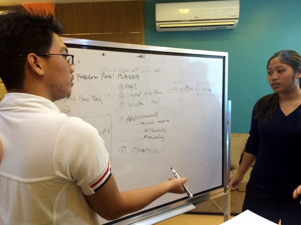 IDEATION. Ginbert Cuaton and Therese Mendoza ideating on how to create a plaza. 