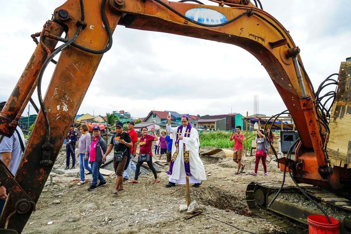 'EXPRESSION OF CHARITY.' Caloocan Bishop Pablo Virgilio David says this relocation site for 40 urban poor families in Malabon is a 'concrete expression of charity' by donors whom he kept anonymous. Photo by Jire Carreon/Rappler     
