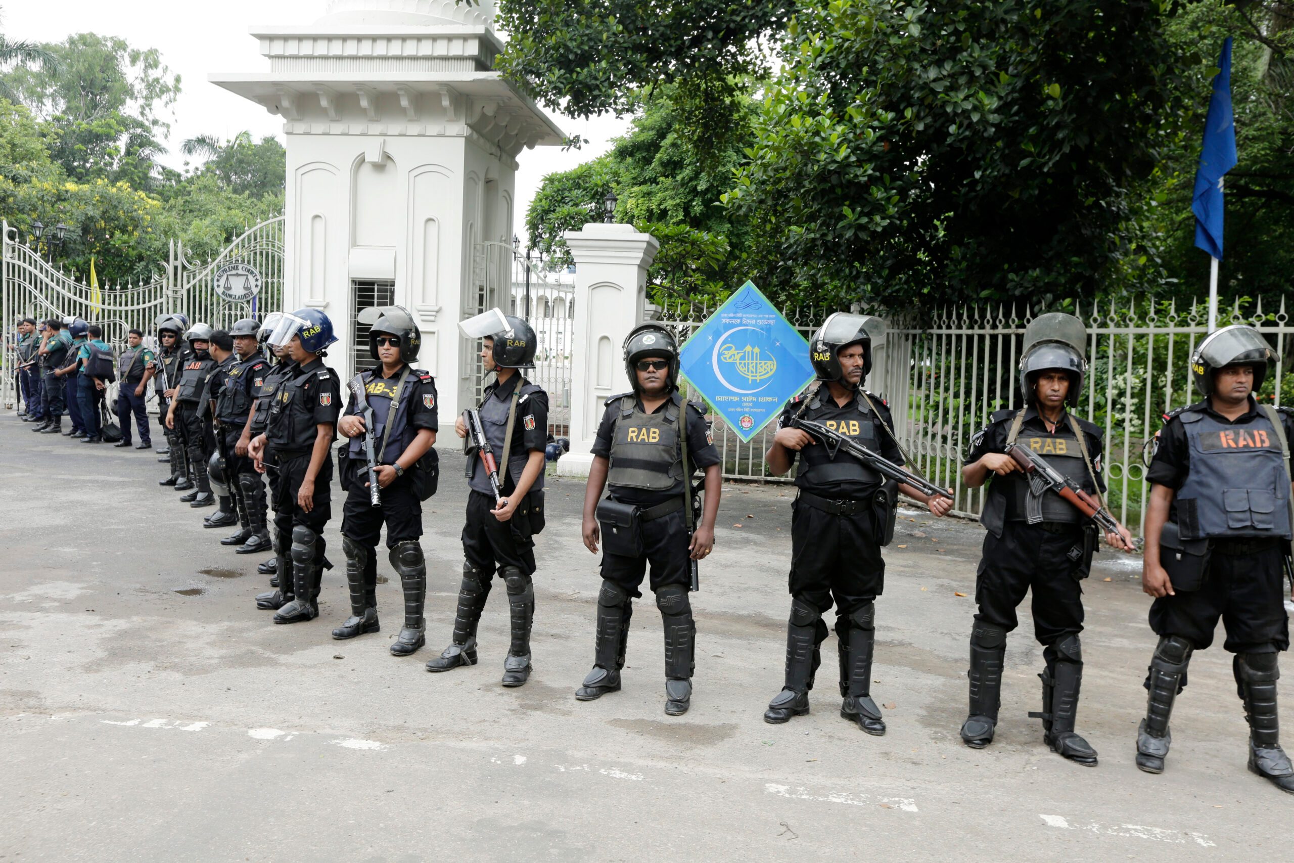 Bangladesh bans TV station, tracks students after attacks