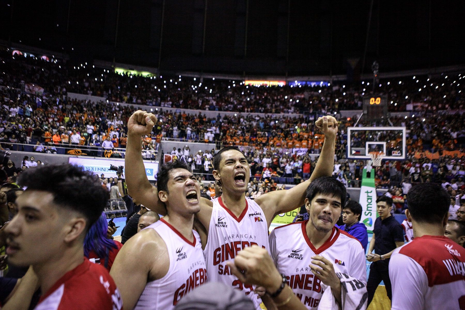VICTORY. Dave Marcelo, Japeth Aguilar, and Jervy Cruz celebrate the win. Photo by Josh Albelda/Rappler 