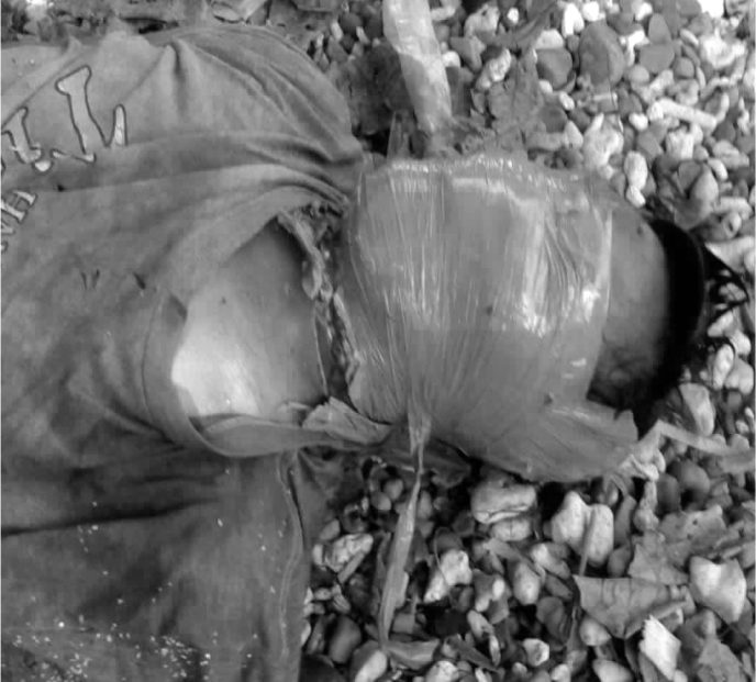 PACKING TAPE. The body of Ronald 'Ka Onald' Miranda found, with his face wrapped in packing tape. Rappler sourced photo  