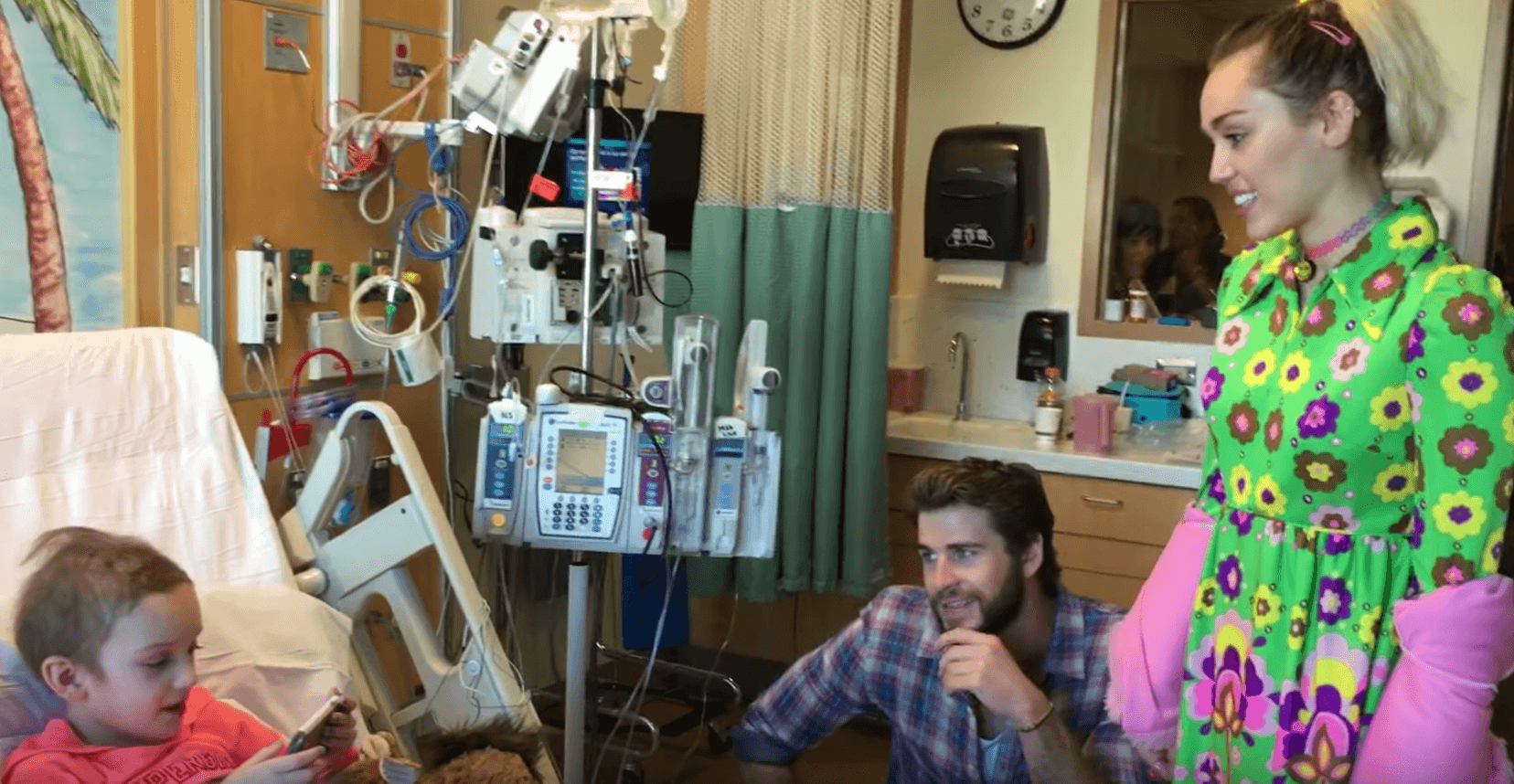 WATCH: Miley Cyrus, Liam Hemsworth hear young cancer patient sing