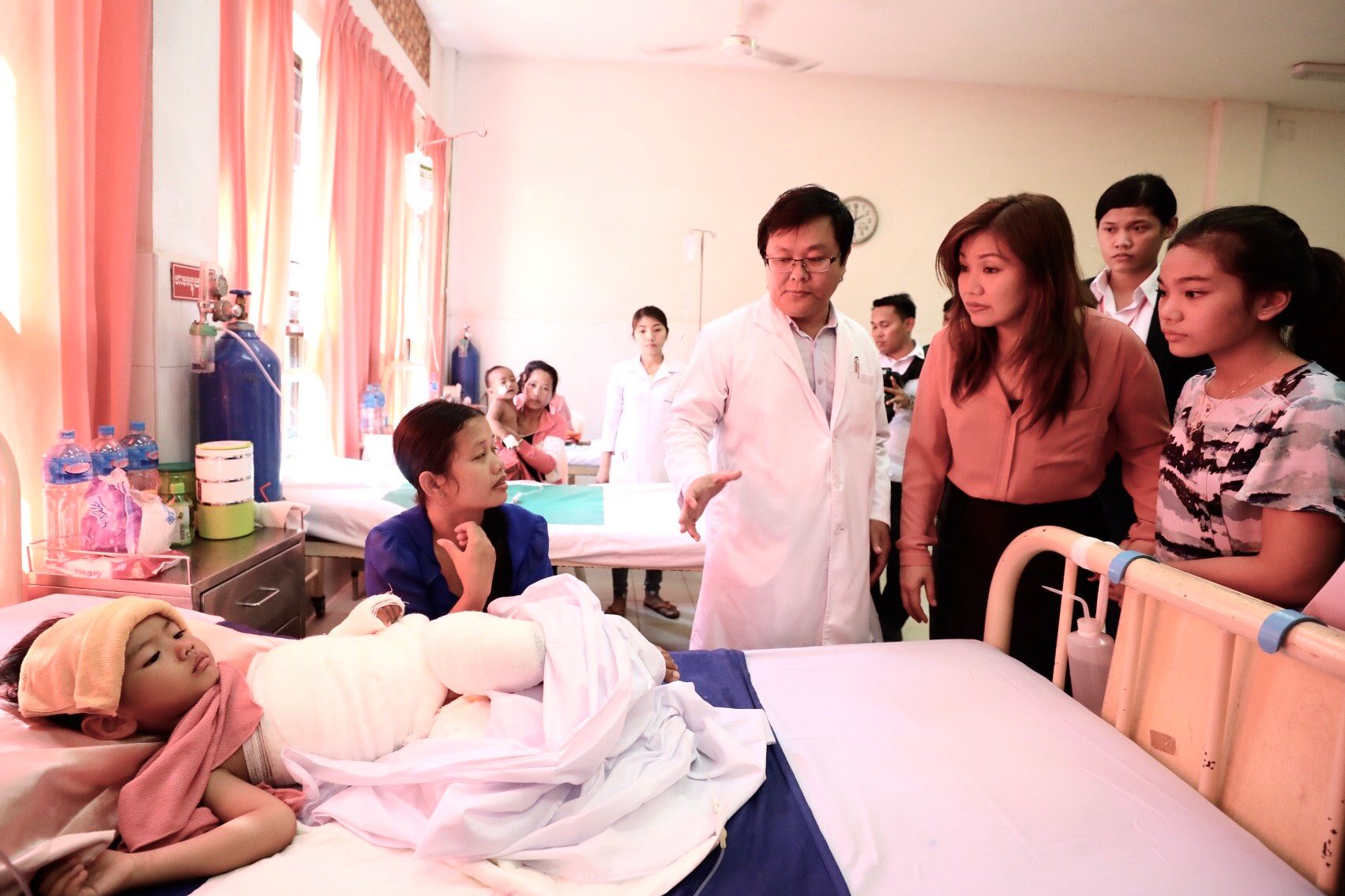 HOSPITAL VISIT. Honeylet and Kitty are briefed about the condition of a sick child at the Kantha Bopha IV Children's Hospital 