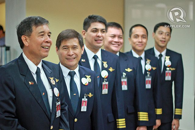 PAPAL PILOTS. They all serve the Pope. (From left): Captains Manuel Antonio Tamayo, Ruel Isaac, Roland Narciso, George Alvarez, and First Officers Wilfredo Valencia and Anthony Atendido. Photo by Mick Basa / Rappler.com
