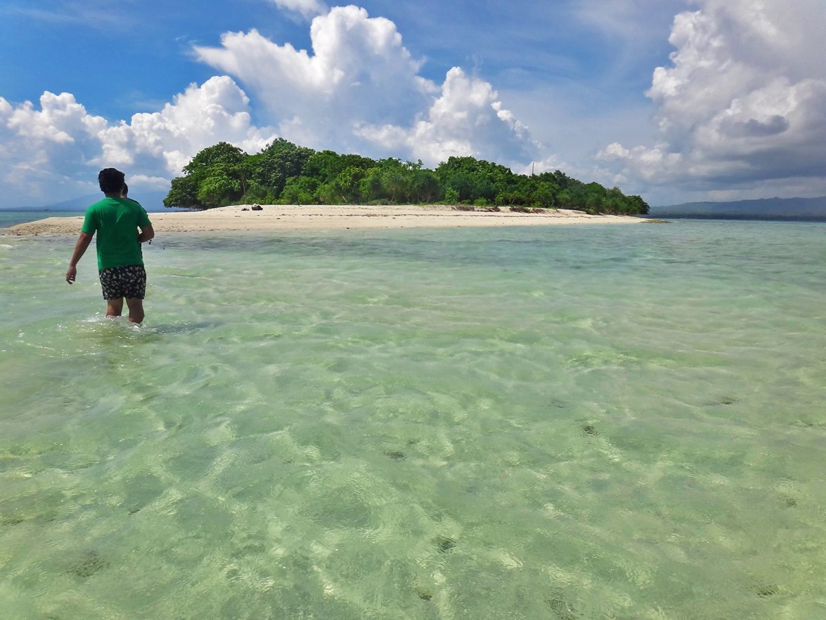 PRISTINE ISLET. Canigao is a small island rich in greenery and fringed with white sand, and in some parts, flat gray rocks. Photo by Rhea Claire Madarang 