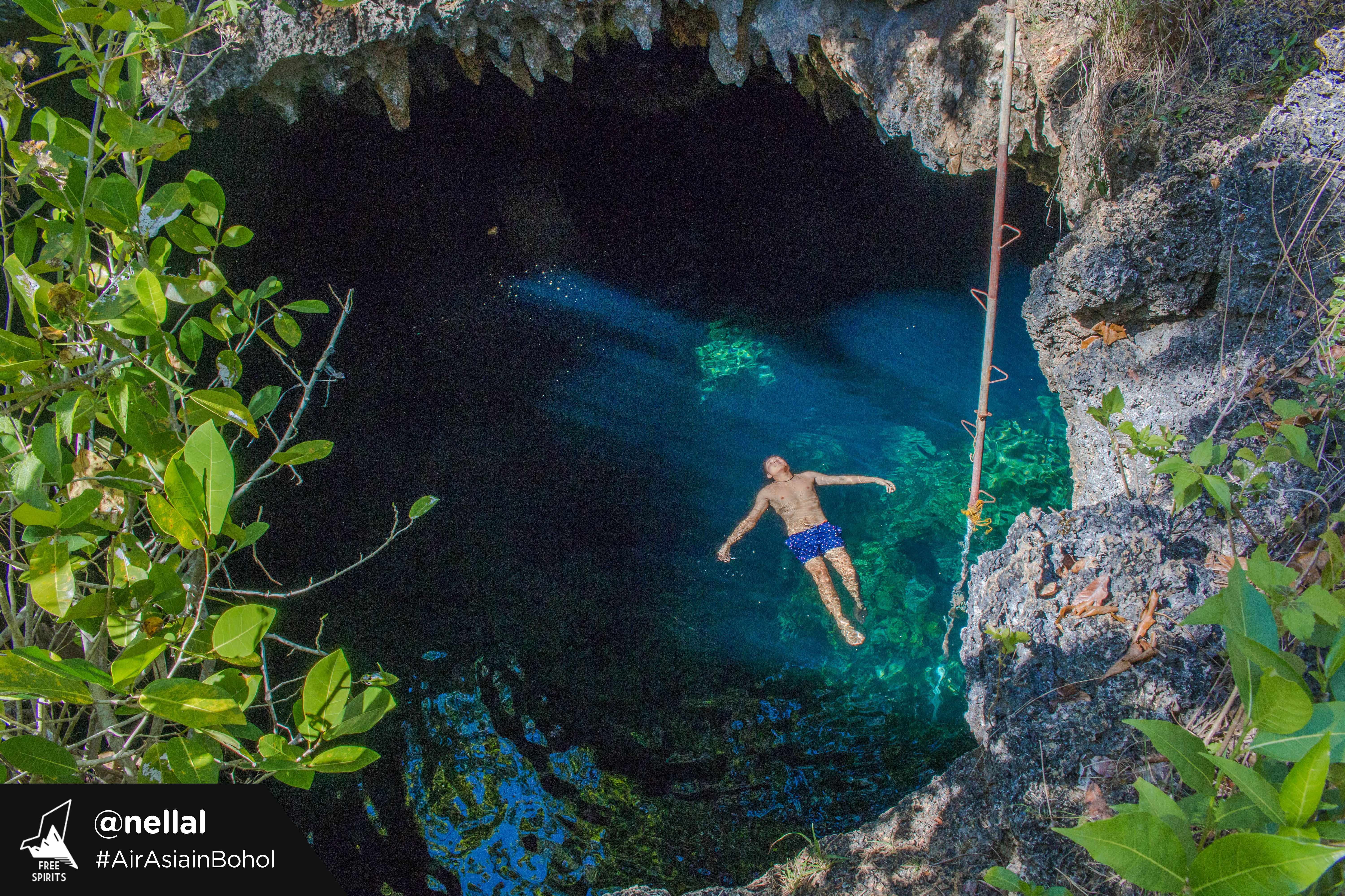 DARK AND DEEP. Cabagnow, or Kabagno, is known as the deepest and most beautiful cave pool in Anda. Photo by Nella Lomoton, courtesy of AirAsia 