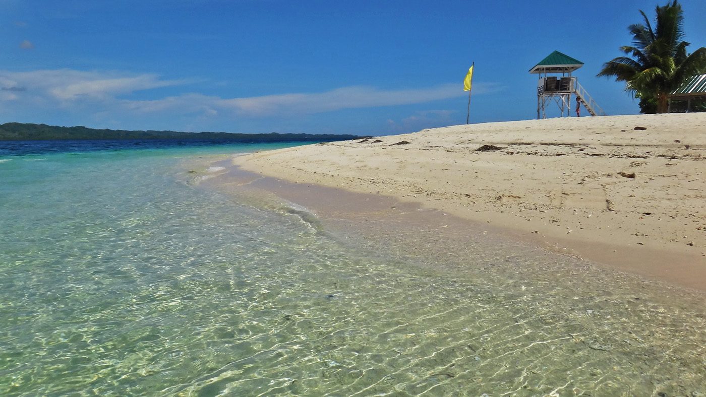 BLUES AND WHITES. On a sunny day, Canigao's clear waters reflect the skyâs blue, and its white sand shines bright. Photo by Rhea Claire Madarang 