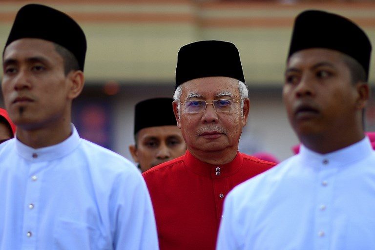 Malaysia’s Najib Razak denies graft charges in visit to home region