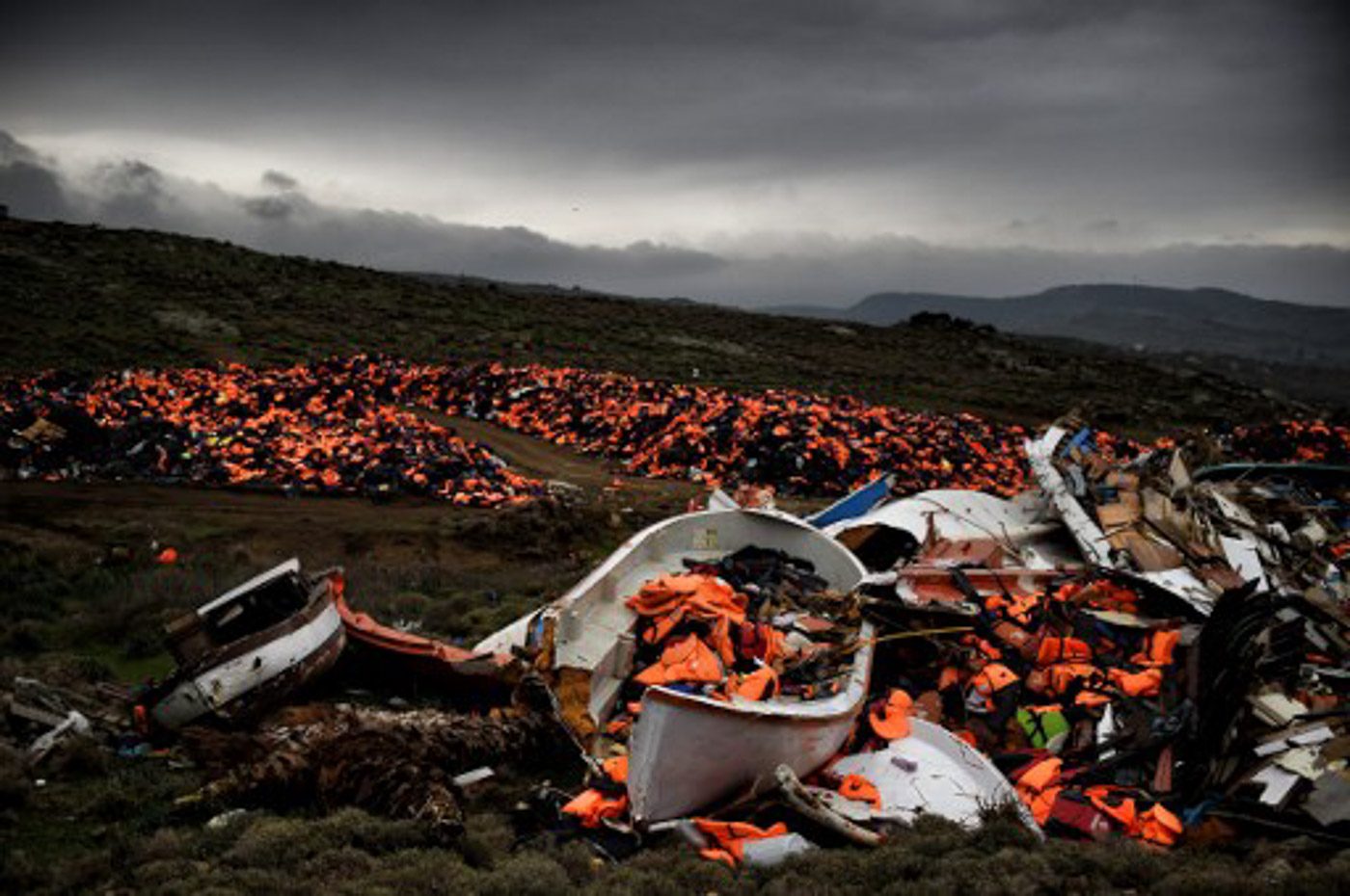 Wrecked boats and thousands of life jackets used by refugees and migrants during their journey across the Aegean sea lie in a dump in Mithimna on February 19, 2016. Aris Messinis/AFP 