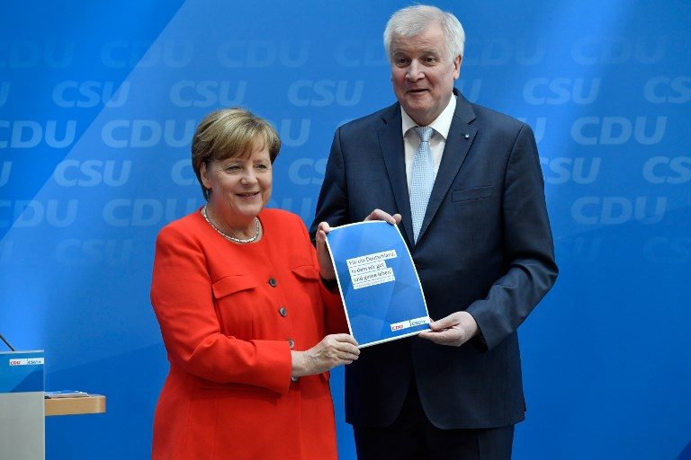 Merkel in German campaign kick-off pledges full employment
