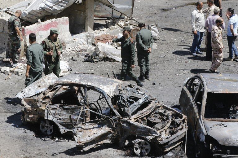 Damascus bomber kills 18 after car chase