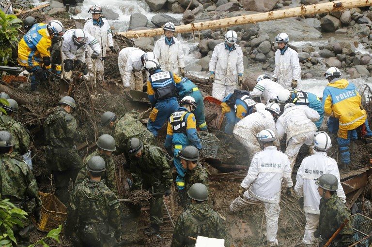 Rescuers scramble to find missing after Japan floods