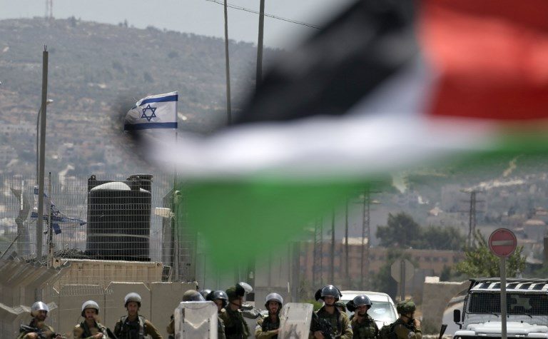 Israel rejects UN report on protecting Palestinians