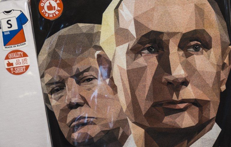 Trump walks diplomatic tightrope in first Putin encounter