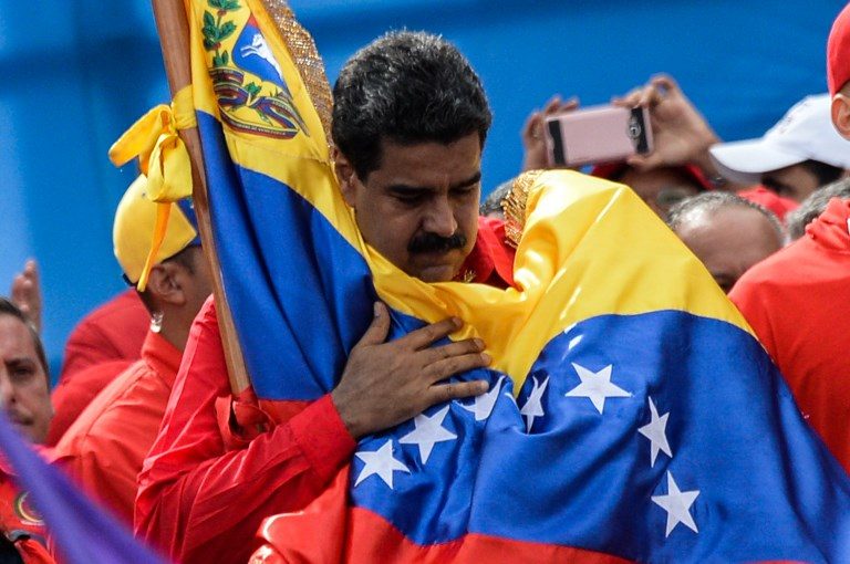 Maduro holds Venezuela vote, defying protests, international scorn
