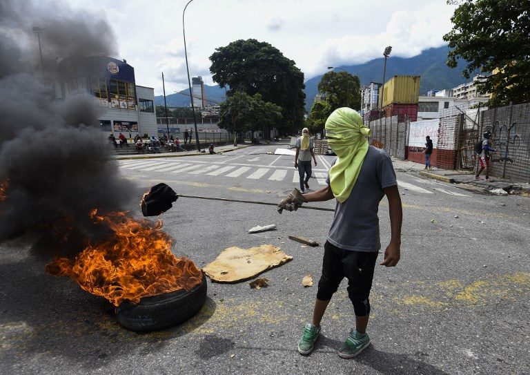 Venezuela’s government, opposition on deadly collision course