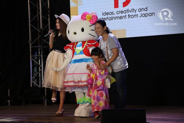 PHOTO OP. Hello Kitty with a cute girl in kimono, and event host Janeena Chan, during the second day of the festivaL 