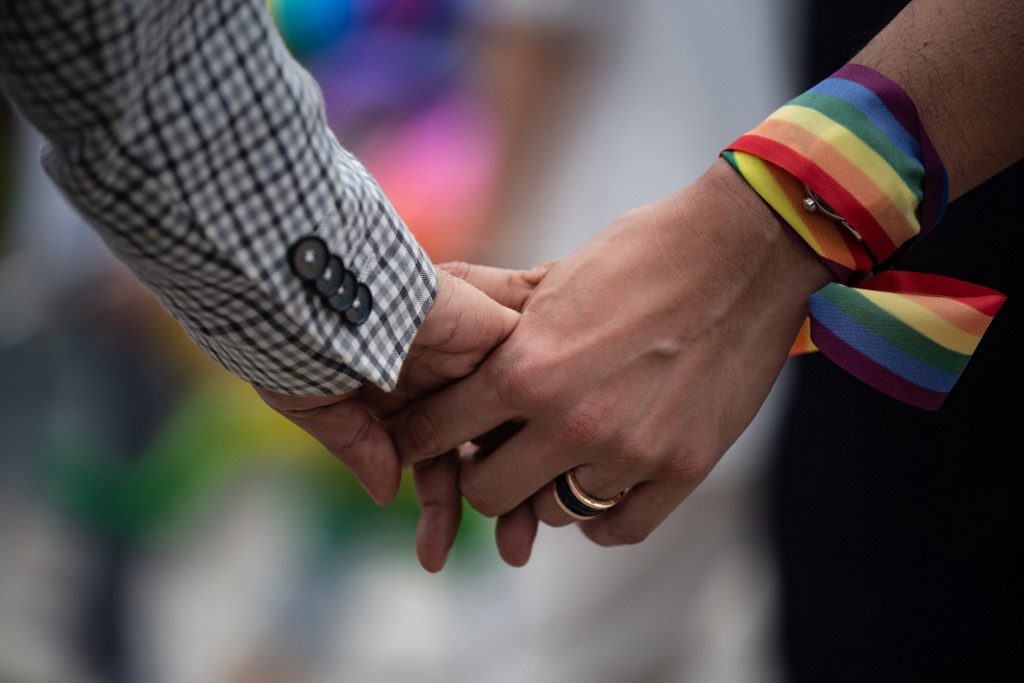Hong Kong court declares male gay sex laws unconstitutional