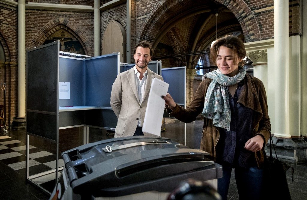 THIERRY BAUDET. Netherlands far-right party Forum for Democracy (FvD) leader Thierry Baudet watches his fiancee Davide Heijmans casting her ballot for the European elections at a polling station at the Posthoornkerk basilica in Amsterdam on May 23, 2019. Photo by Koen van Weel/ANP/AFP 
