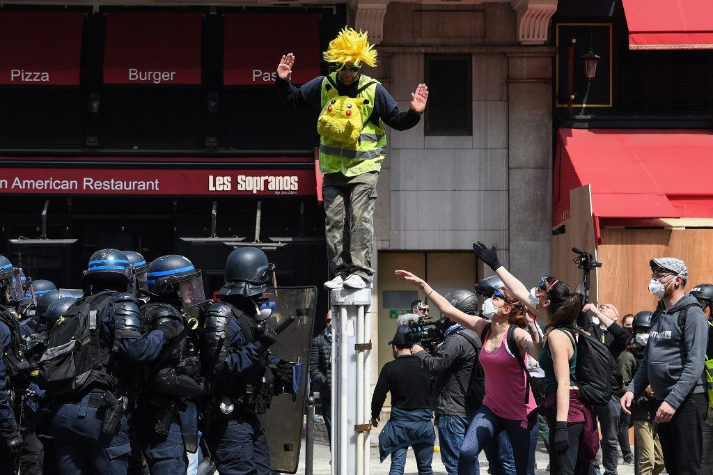 Paris police clash with protesters ahead of May Day march