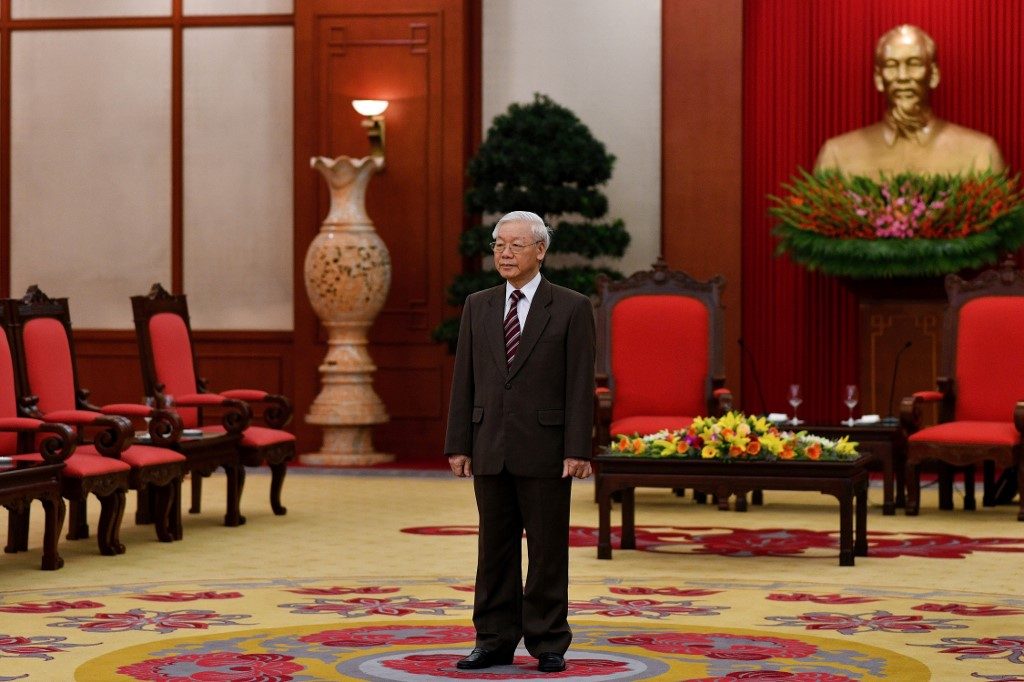 Vietnam president emerges after month-long sick leave