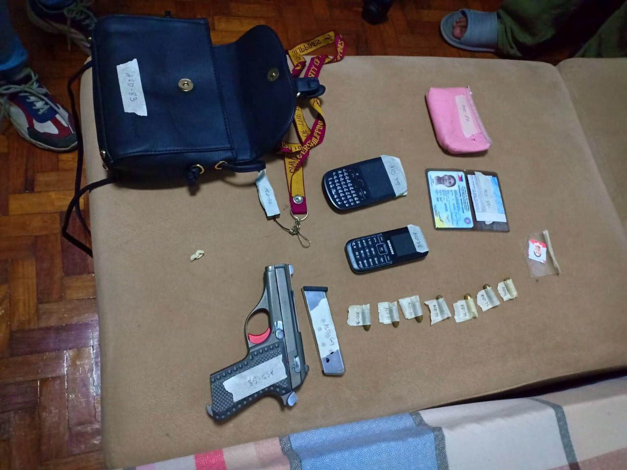 CONFISCATED. A gun, ammunition, and a CPP-NPA flag are among the items found in Antonia Setias Dizon's possession during her arrest on September 17, 2019. Photo from the Armed Forces of the Philippines  