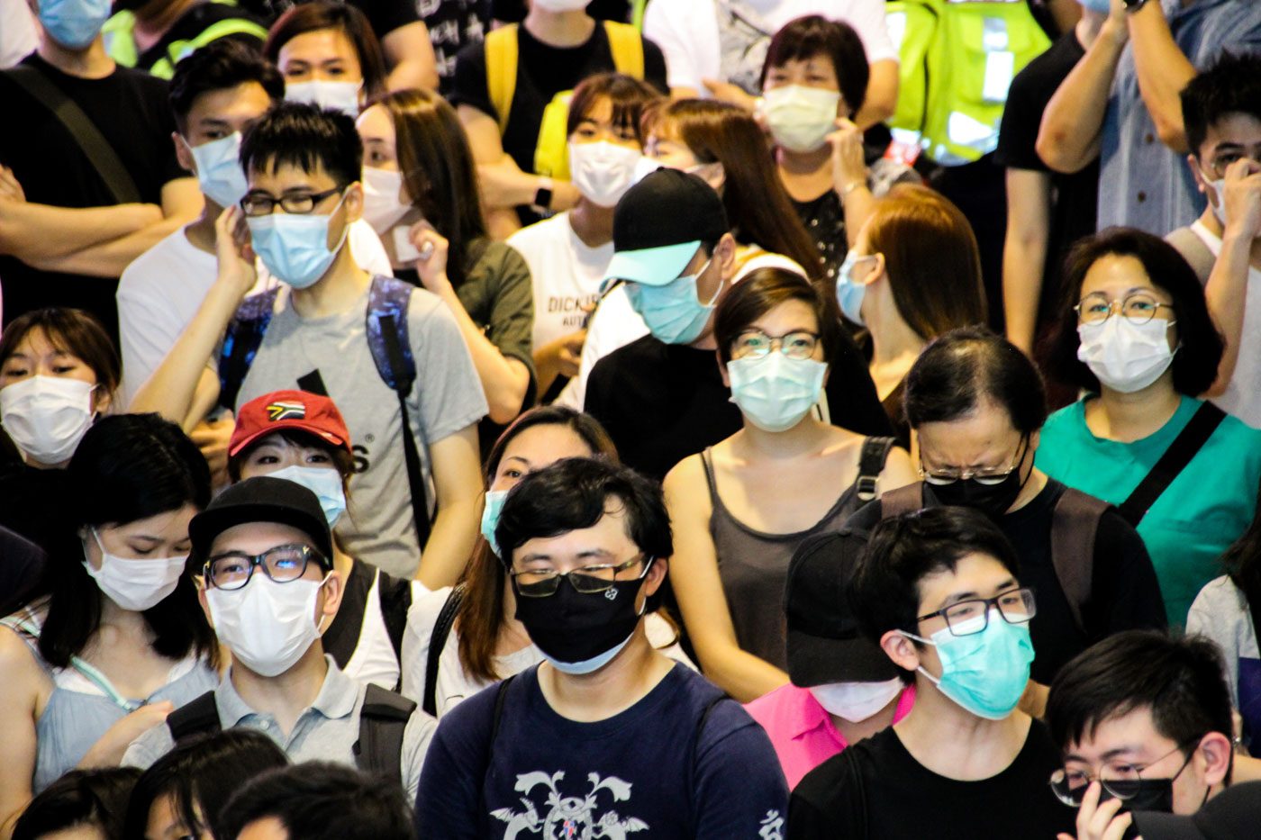 COVID-19 IN HONG KONG. Residents in Hong Kong have been quick to take precautions against the coronavirus. This file photo shows Hongkongers in Tsim Sha Tsui on May 10, 2020. File photo by Tommy Walker/Rappler 