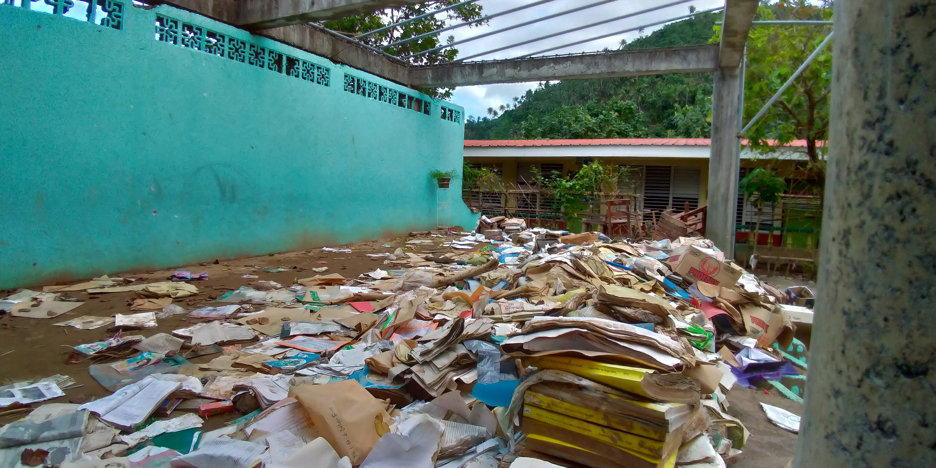 DESTROYED BOOKS. The school is waiting for replacements from the Department of Education. Photo by Mavic Conde/Rappler 