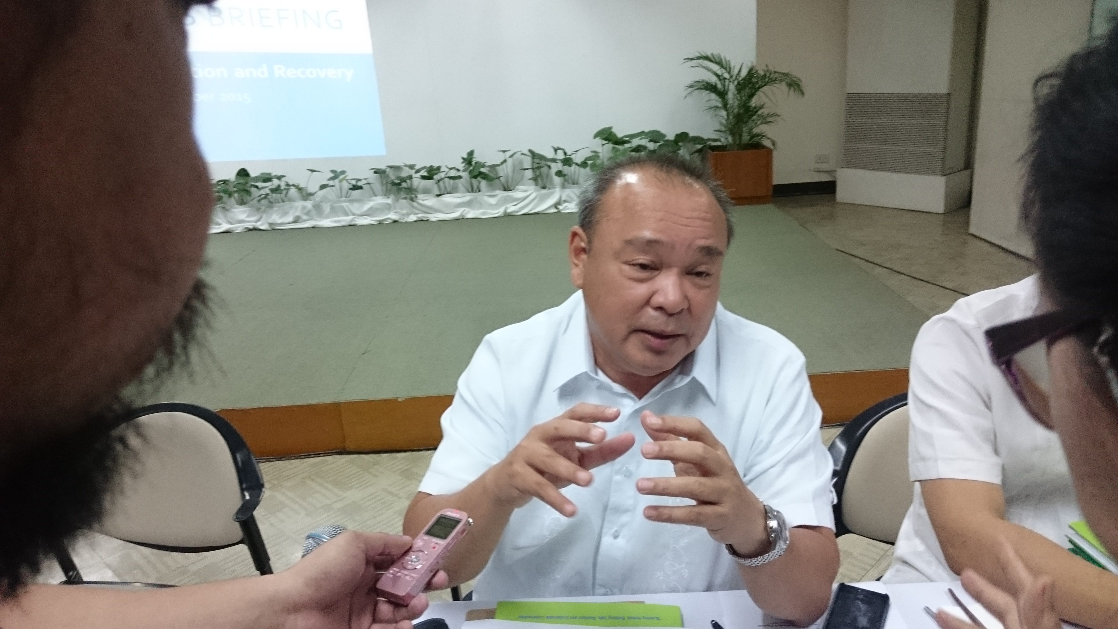 PROCUREMENT DIFFICULTIES. HUDCC chief Chito Cruz explains existing government procurement policies take 3 months and are partly to blame for the slow progress of resettlement housing.   