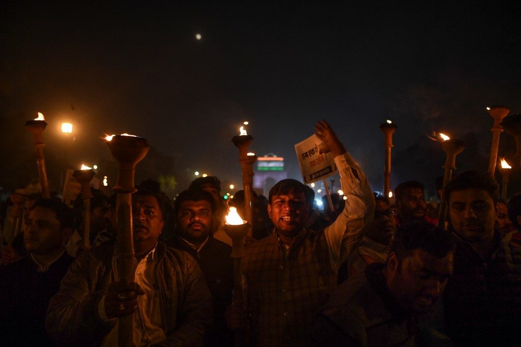 Death toll hits 21 as India protests rage on