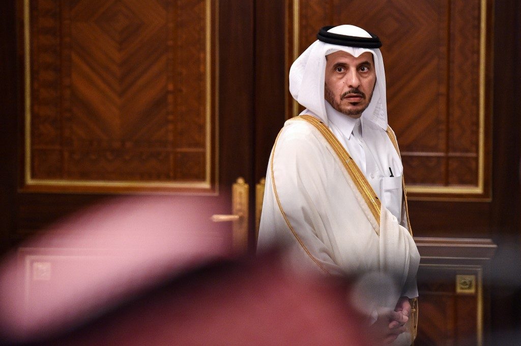 Qatar emir skips summit but warm words point to thaw with Saudi