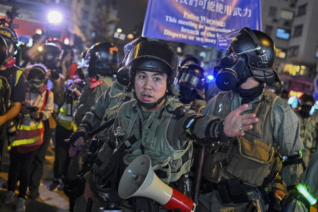 China warns Hong Kong protesters against ‘stirring up trouble’