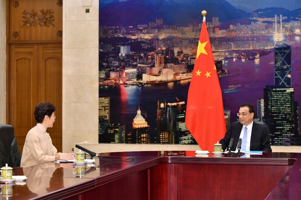 China’s Xi gives Hong Kong leader ‘unwavering support’