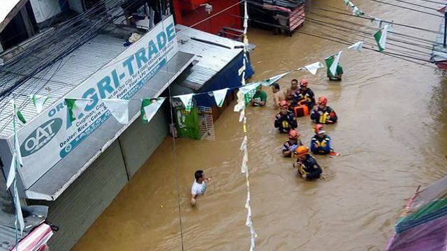 LOOK: Residents evacuate due to heavy flooding in Cagayan de Oro