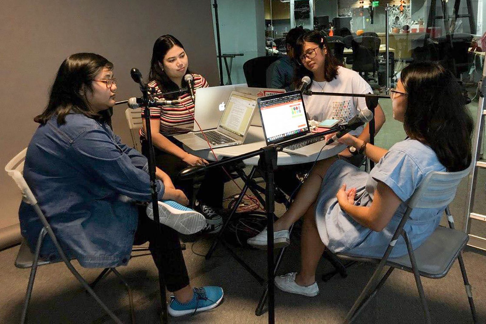 PODCAST. Rappler reporters take turns in churning out regular podcasts. In this photo (clockwise from left) are Jodesz Gavilan, Sofia Tomacruz, Lian Buan, and Mara Cepeda. Photo by Charles Salazar/Rappler 