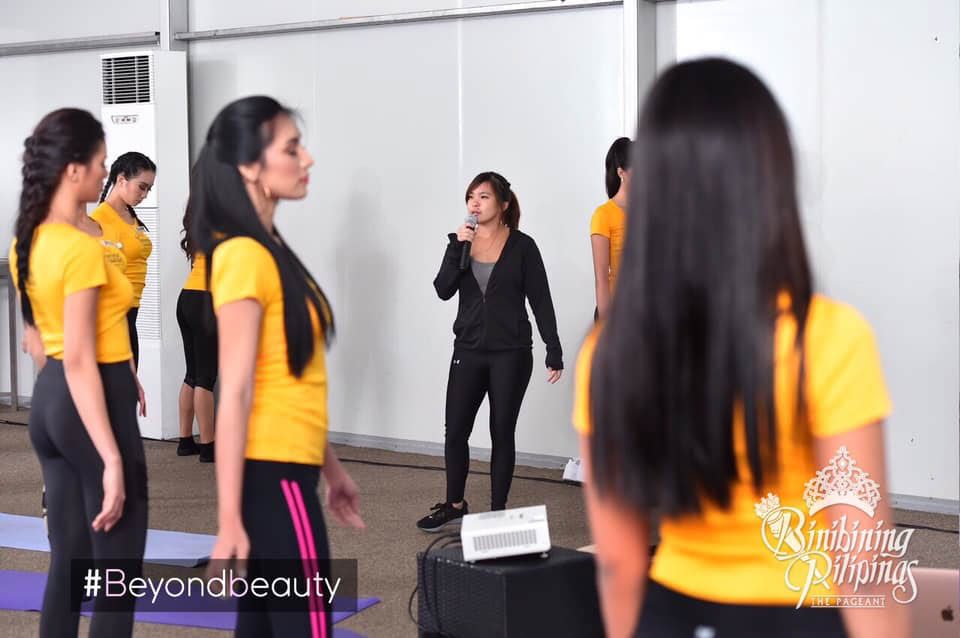 MOVE.  Movement coach, Mara Andres, guides the ladies through one of the exercises where they had to walk around the venue with eyes closed relying on their instinct and other senses. 