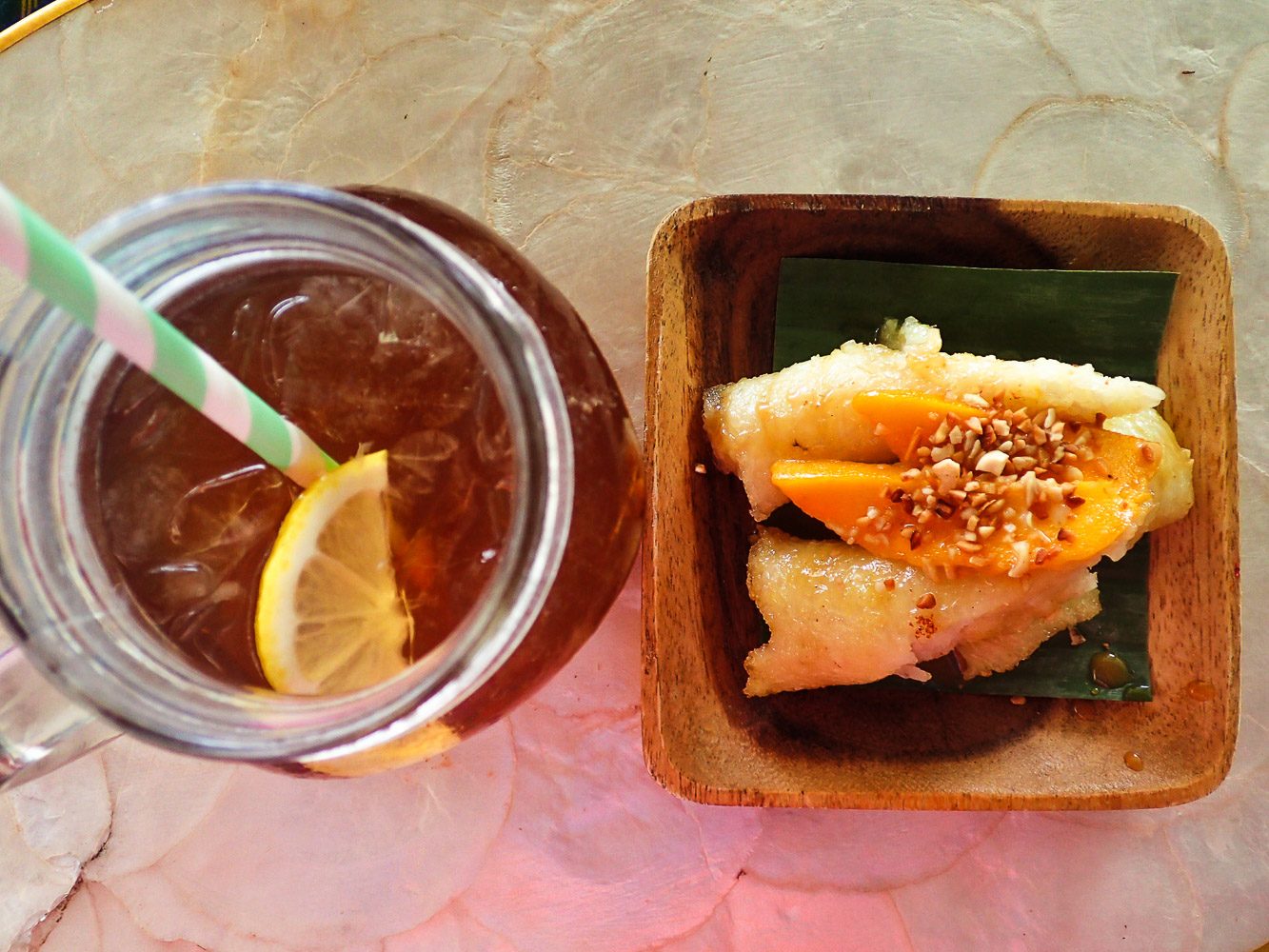 STAPLE SNACK. A snack of Antipolo suman and lemongrass iced tea is served to all Luljetta's guests.  