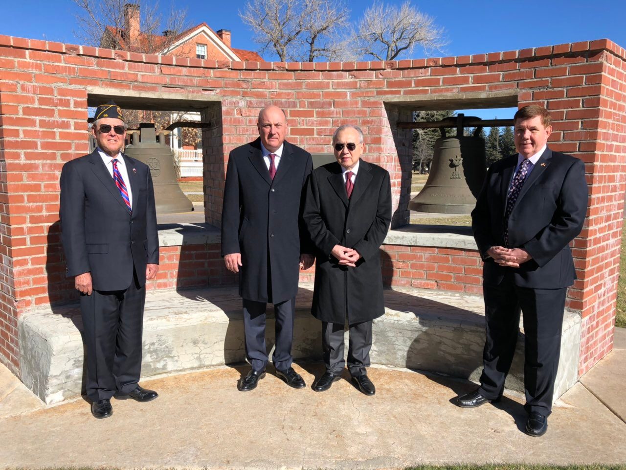 FILIPINO ENVOY. Philippine Ambassador to the US Jose Manuel Romualdez (3rd from left) poses with retired American captains and an honorary consul before the historic Balangiga Bells. Photo by Gunther Sales/Philippine embassy in Washington DC 