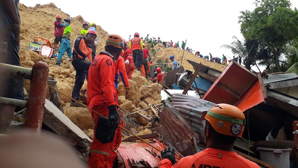 RESCUE. Responders dig for survivors of the landslide in Naga City, Cebu. File photo by Jadee Borinaga
 