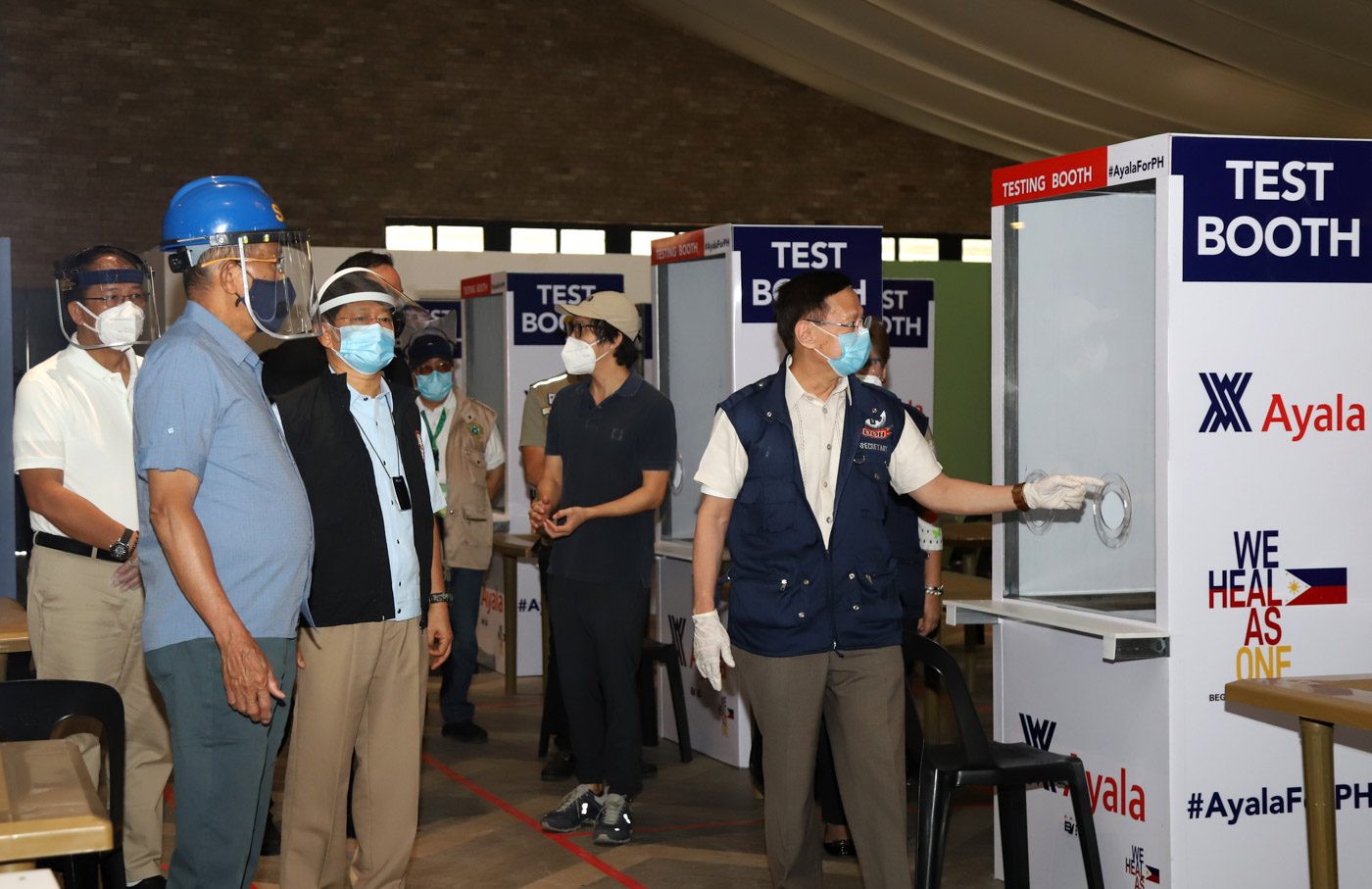 SWAB CENTER. Cabinet officials inspect the government's 'mega swabbing center' at Enderun Colleges in Taguig City on May 6, 2020. Photo from the Department of National Defense 