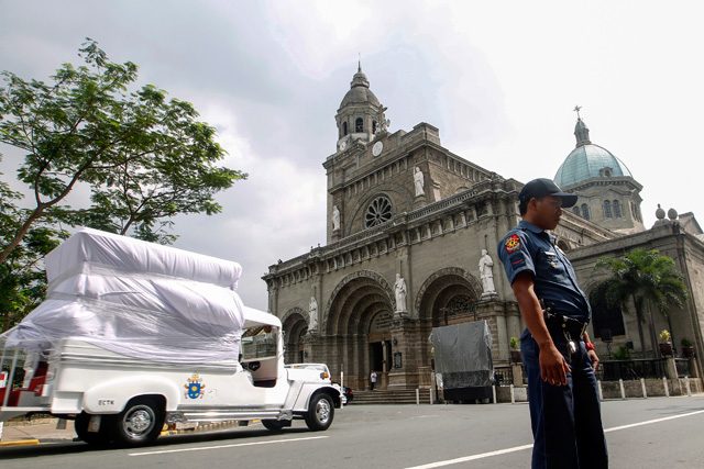 The popemobile is parked in front of the Manila Cathedral during preparations for the papal visit. Rappler file