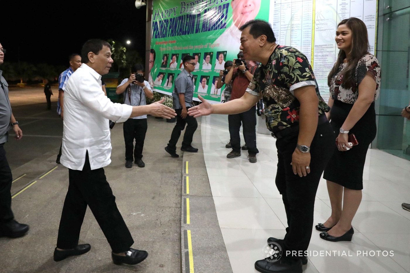 WELCOME. Alvarez and his girlfriend Jennifer Maliwanag greet Duterte upon his arrival.  