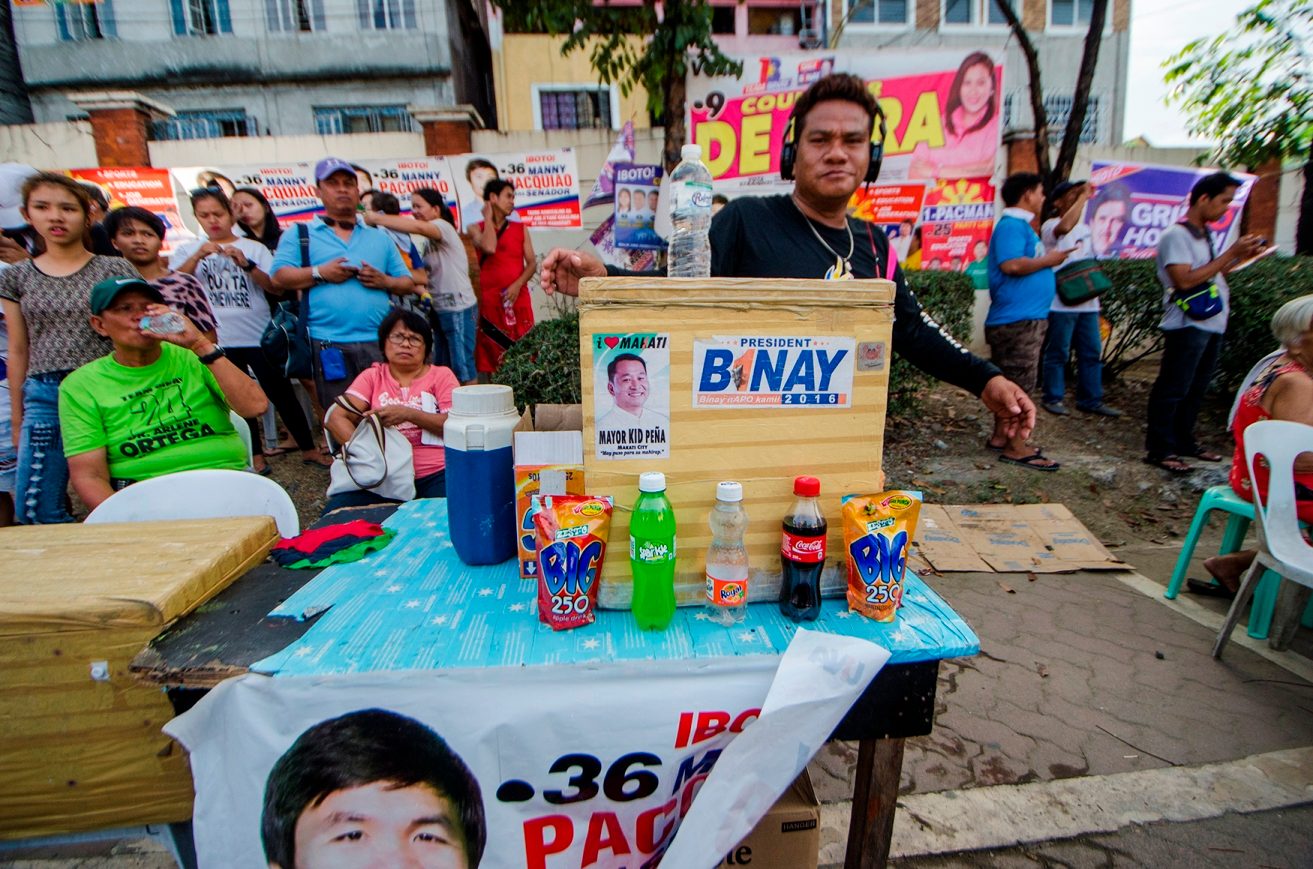 TWO MAKATIS. Stickers of VP Binay and acting Mayor Kid Peña, Abby Binay's opponent, are seen on a vendor's ice box.  