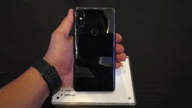 CERAMIC BUILD. The back has what Xiaomi calls a curved ceramic design, which it says is twice as hard as typical smartphone glass 