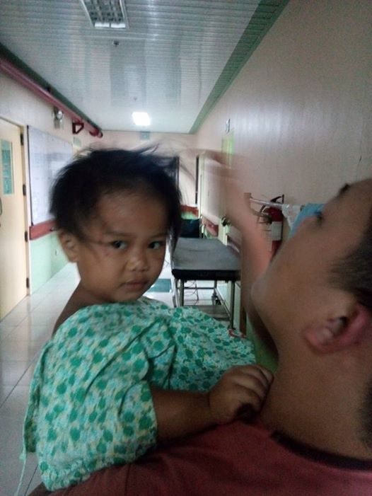 UNIDENTIFIED. A hospital worker attends to a child survivor of a bus crash that killed nearly 30 people in Nueva Ecija. Photo from Veterans Regional Hospital of Nueva Vizcaya  