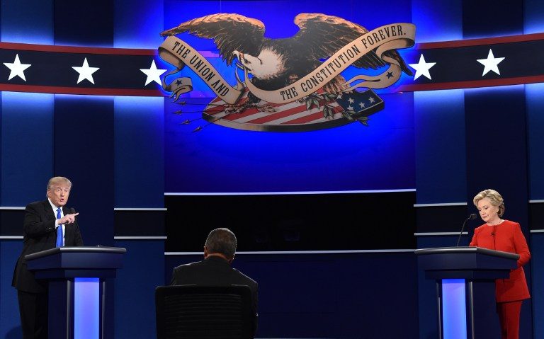 Republican candidate Donald Trump and Democratic nominee Hillary Clinton face off during the first presidential debate at Hofstra University in Hempstead, New York on September 26, 2016. Paul J. Richards/AFP 