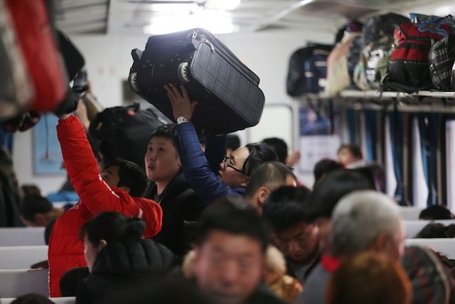 Tens of thousands of Chinese new year travellers stranded