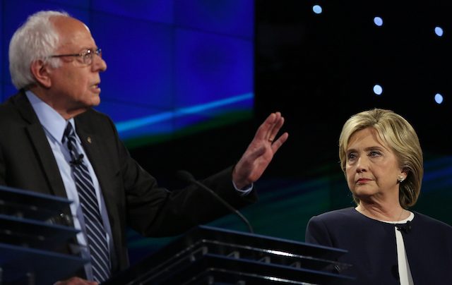Clinton goes on the attack against surging Sanders