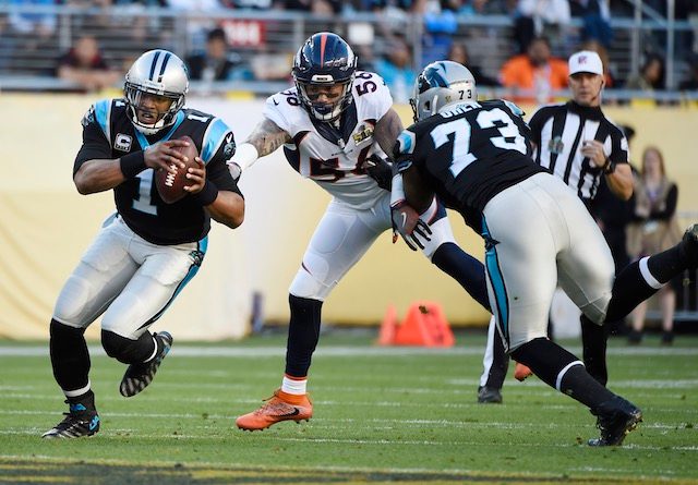 IN ACTION. Carolina Panthers quarterback Cam Newton (L) scrambles with the ball in the second quarter of the NFL's Super Bowl 50 between the AFC Champion Denver Broncos and the NFC Champion Carolina Panthers at Levi's Stadium in Santa Clara, California, USA, February 7, 2016. John G. Mabanglo/EPA 